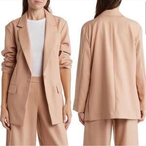 Cream Blazer with Notched Lapels and Textured Fabric